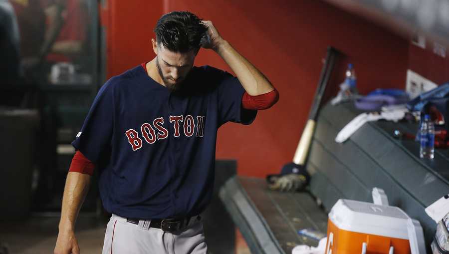 Boston Red Sox starting pitcher Rick Porcello paces in the dugout after being pulled from a baseball game during the fifth inning against the Arizona Diamondbacks Friday, April 5, 2019, in Phoenix. (AP Photo/Ross D. Franklin)