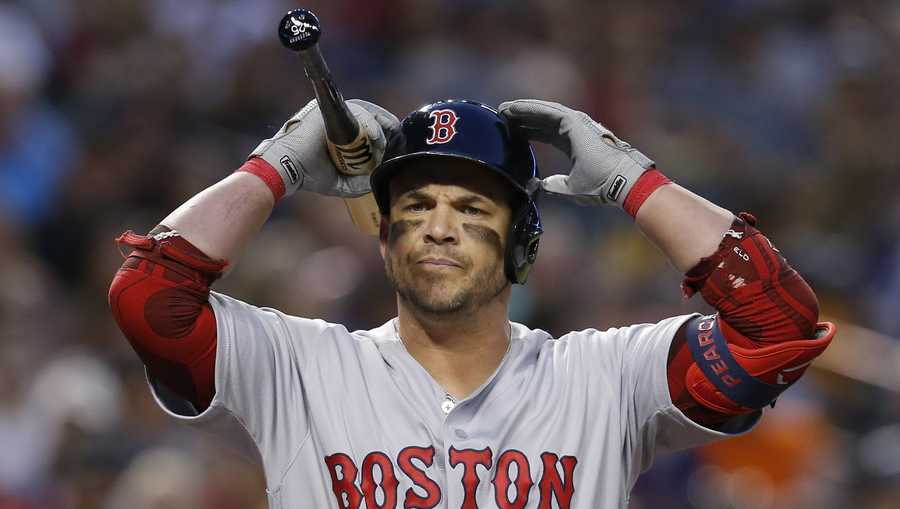Boston Red Sox's Steve Pearce reacts after being called out on strikes in the fifth inning during a baseball game against the Arizona Diamondbacks, Saturday, April 6, 2019, in Phoenix. (AP Photo/Rick Scuteri)