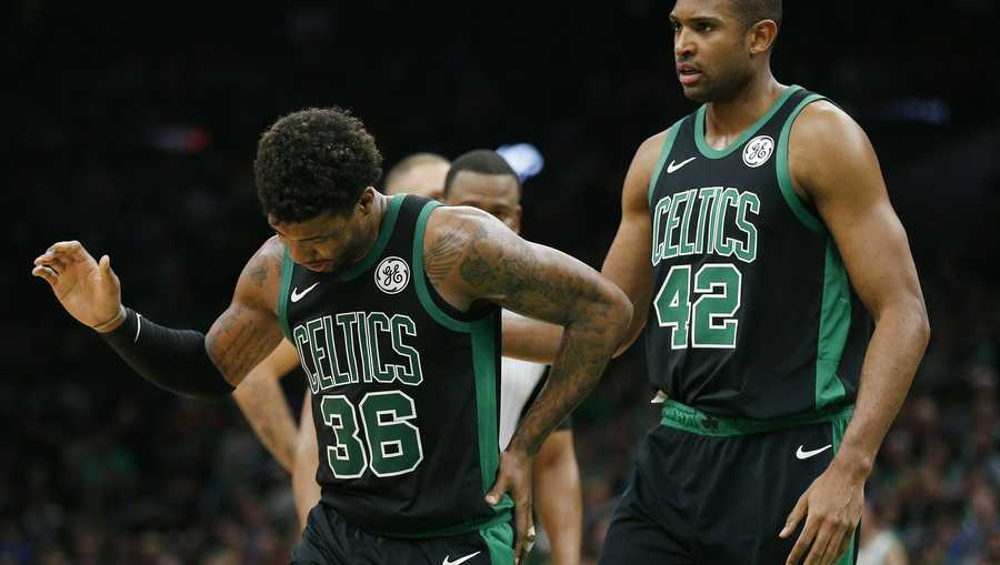 Boston Celtics' Marcus Smart (36) leaves the court during the second half of an NBA basketball game against the Orlando Magic in Boston, Sunday, April 7, 2019. (AP Photo/Michael Dwyer)