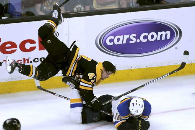 Torey Krug calls comparison between images of Game 1 hit, iconic Bobby Orr goal &#39;pretty ridiculous&#39;