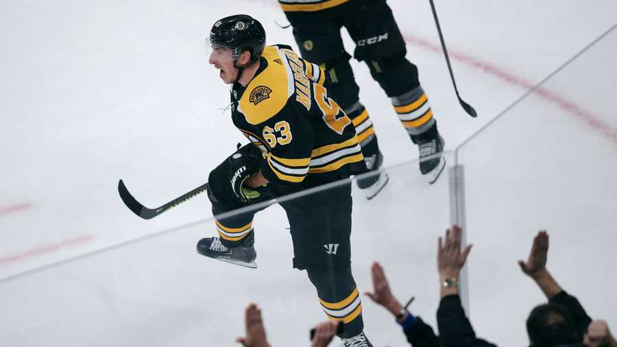 Boston Bruins center Brad Marchand celebrates after his winning goal off Pittsburgh Penguins goaltender Tristan Jarry during the third period of an NHL hockey game in Boston, Monday, Nov. 4, 2019. (AP Photo/Charles Krupa)