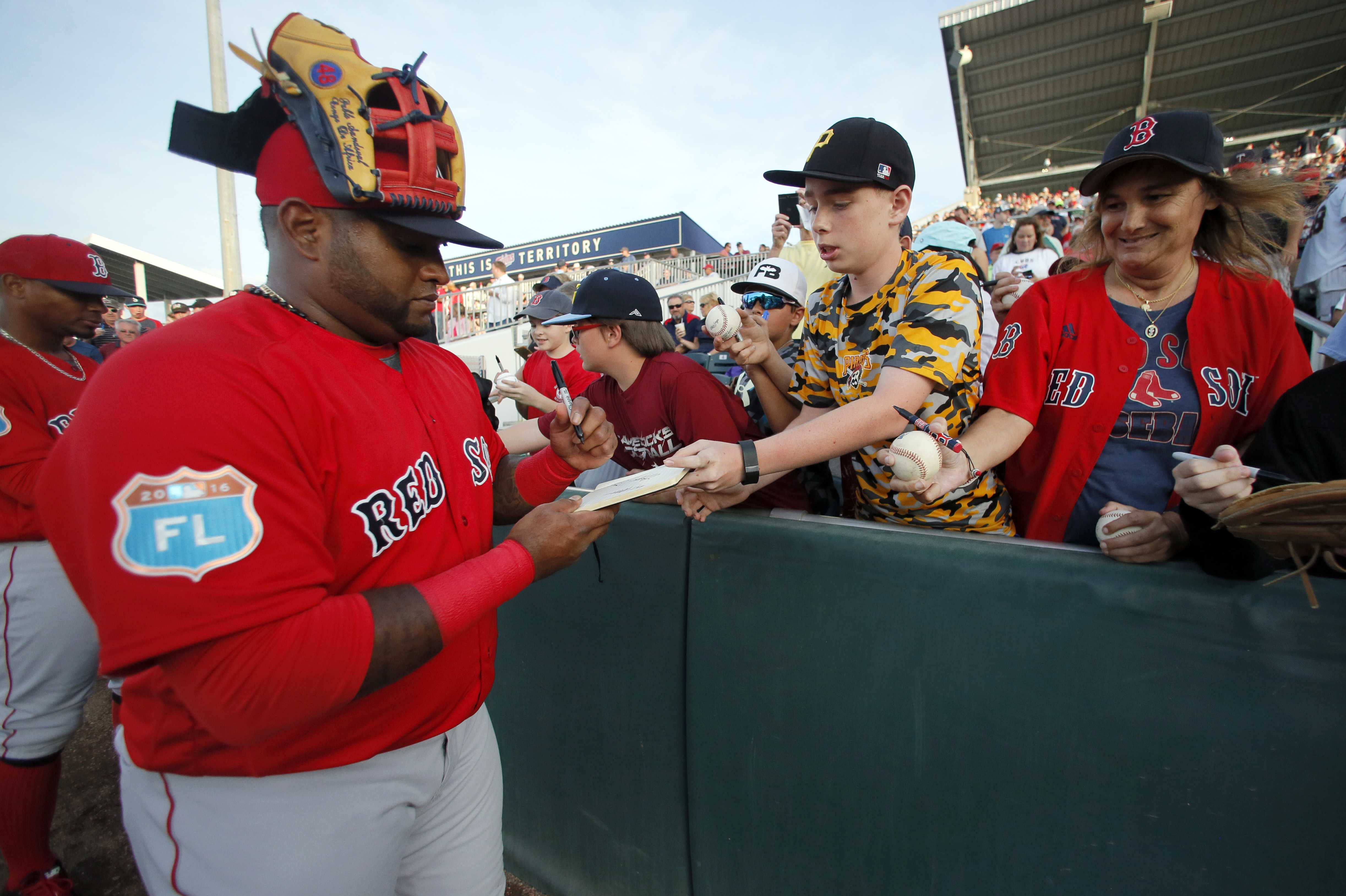 That's a weight loss home run! Red Sox third baseman Pablo Sandoval shows  off much fitter new physique