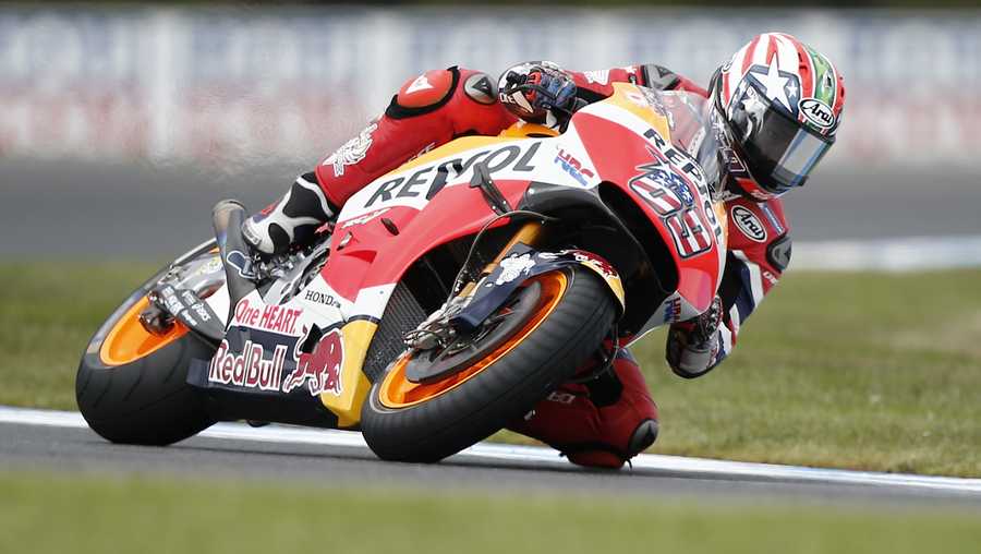 Honda MotoGP rider Nicky Hayden controls his bike on turn 11 during the free practice session number three of the Australian Motorcycle Grand Prix at Phillip Island, Australia, Saturday, Oct. 22, 2016.