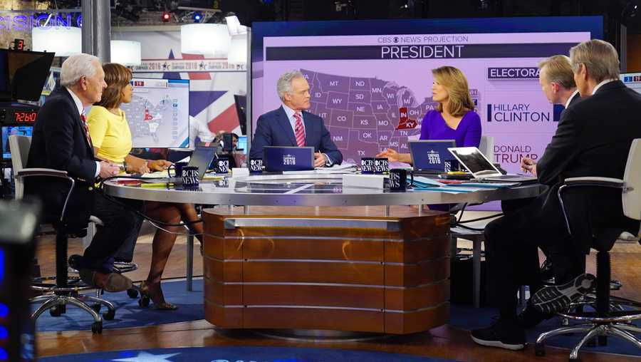 In this image released by CBS, CBS News Contributor Bob Schieffer, from left, CBS This Morning co-host Gayle King, CBS Evening News anchor Scott Pelley, CBS This Morning co-host Norah O\'Donnell, Face the Nation anchor John Dickerson and CBS This Morning co-host Charlie Rose host 2016 election night coverage on Nov. 8, 2016, at the CBS Broadcast Center in New York. 