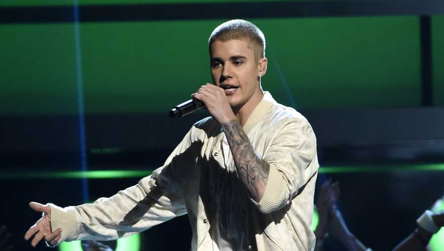 FILE - In this May 22, 2016 file photo, Justin Bieber performs at the Billboard Music Awards in Las Vegas. Bieber scored four Grammy nominations with his redemption album “Purpose” nominated for album of the year, announced Tuesday, Dec. 6. (Photo by Chris Pizzello/Invision/AP, File)