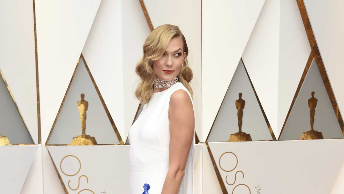 What the blue ribbons stars are wearing on the Oscars red carpet mean