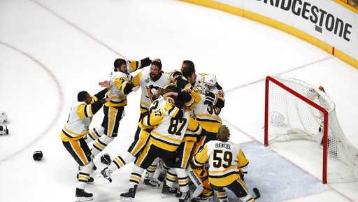 Penguins players celebrate Stanley Cup with adorable photos of kids in the  trophy