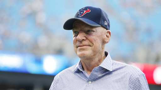 Houston Texans owner Robert C. McNair walks on the field before the first half of an NFL preseason football game between the Carolina Panthers and the Houston Texans, Wednesday, Aug. 9, 2017, in Charlotte, N.C.