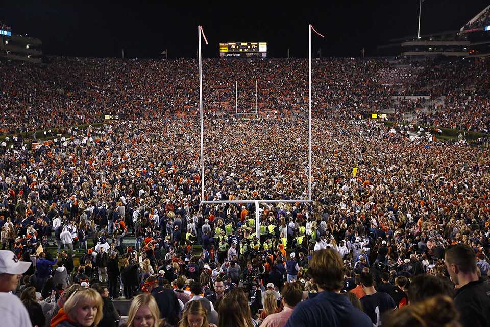 Auburn Fans Storm Field After Iron Bowl Win Over Alabama, School Incurs ...