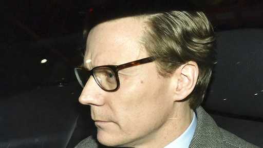 Chief Executive of Cambridge Analytica (CA) Alexander Nix, leaves the offices in central London on Tuesday, March 20, 2018. Cambridge Analytica has been accused of improperly using information from more than 50 million Facebook accounts. It denies wrongdoing.