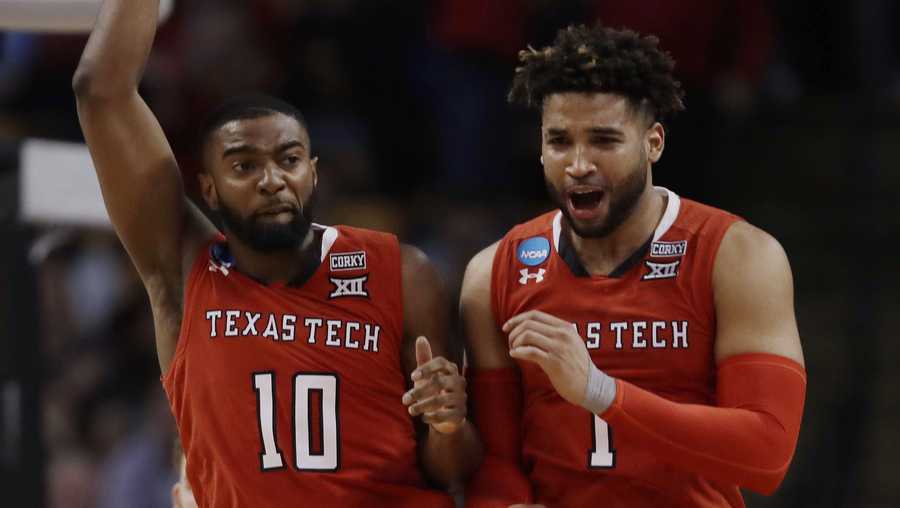 Texas Tech's Niem Stevenson, left, and Brandone Francis celebrate during the second half of the team's NCAA men's college basketball tournament regional semifinal against Purdue, Friday, March 23, 2018, in Boston.