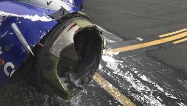 This April 17, 2018 photo provided by Marty Martinez shows the jet engine casing of a Southwest Airlines airplane