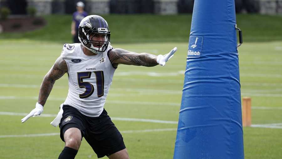 FILE - In this June 13, 2018, file photo, Baltimore Ravens linebacker Kamalei Correa runs a drill during an NFL football practice at the team's headquarters in Owings Mills, Md. The Tennessee Titans have acquired linebacker Kamalei Correa from the Baltimore Ravens for an undisclosed draft pick. The Titans announced the trade Tuesday, Aug. 28, 2018. (AP Photo/Patrick Semansky, File)