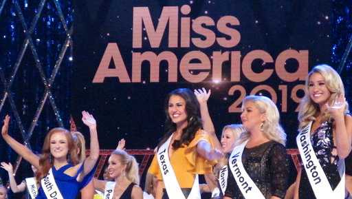 Contestants wave to the audience during introductions at the second night of preliminary competition at the Miss America competition in Atlantic City N.J on Thursday Sept. 6, 2018.