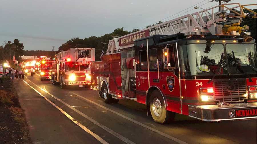 Multiple fire trucks from surrounding communities arrive Thursday, Sept. 13, 2018, in Lawrence, Mass., responding to a series of gas explosions and fires triggered by a problem with a gas line that feeds homes in several communities north of Boston. (AP Photo/Phil Marcelo)
