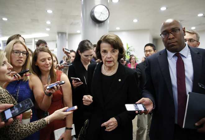 Sen.&#x20;Dianne&#x20;Feinstein,&#x20;D-Calif.,&#x20;listens&#x20;to&#x20;reporter&#x27;s&#x20;questions&#x20;on&#x20;Capitol&#x20;Hill,&#x20;Wednesday,&#x20;Oct.&#x20;3,&#x20;2018&#x20;in&#x20;Washington.&#x20;&#x28;AP&#x20;Photo&#x2F;Alex&#x20;Brandon&#x29;