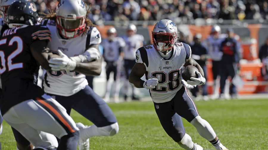 New England Patriots running back James White (28) runs during the first half of an NFL football game against the Chicago Bears Sunday, Oct. 21, 2018, in Chicago. (AP Photo/Nam Y. Huh)