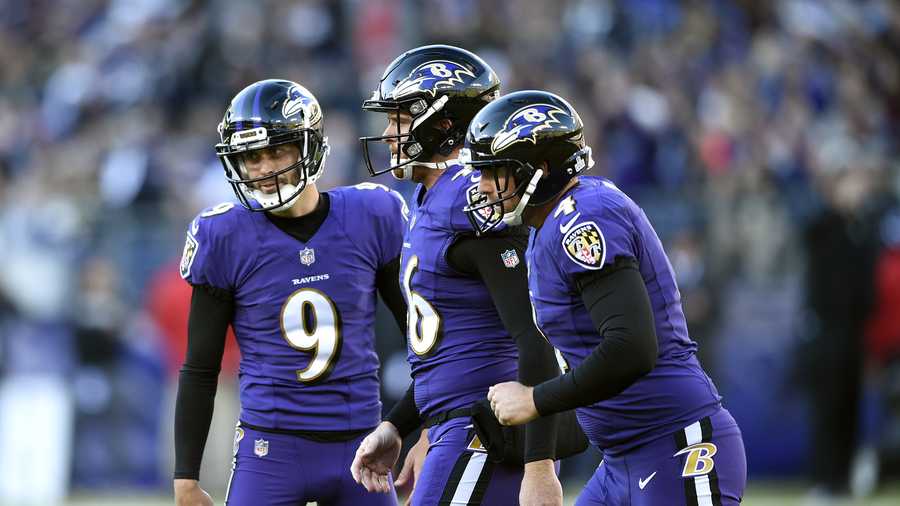 Baltimore Ravens kicker Justin Tucker walks off the field after