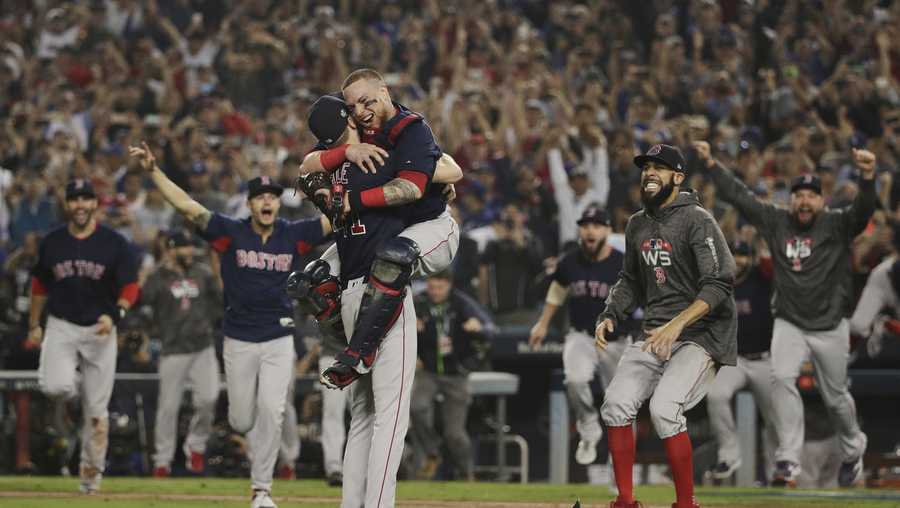 The Boston Red Sox celebrate after Game 5 of baseball's World Series against the Los Angeles Dodgers on Sunday, Oct. 28, 2018, in Los Angeles. The Red Sox won 5-1 to win the series 4 game to 1.