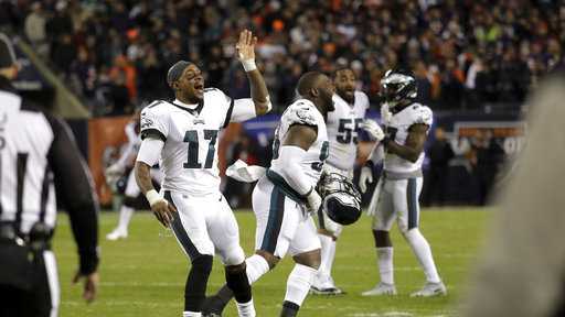 Philadelphia Eagles wide receiver Alshon Jeffery (17) and teammates celebrate after Chicago Bears kicker Cody Parkey misses a field goal during the second half of an NFL wild-card playoff football game Sunday, Jan. 6, 2019, in Chicago. The Eagles won 16-15.