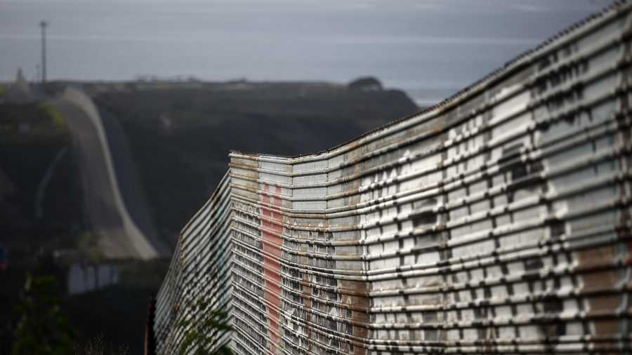 A border wall makes its way towards the ocean Tuesday, Jan. 8, 2019, in Tijuana, Mexico. Ready to make his case on prime-time TV, President Donald Trump is stressing humanitarian as well as security concerns at the U.S.-Mexico border as he tries to convince America he must get funding for his long-promised border wall before ending a partial government shutdown that has hundreds of thousands of federal workers facing missed paychecks. (AP Photo/Gregory Bull)
