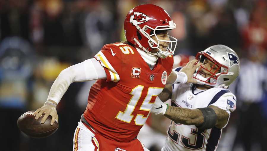 New England Patriots strong safety Patrick Chung (23) pressures Kansas City Chiefs quarterback Patrick Mahomes during the second half of the AFC Championship NFL football game, Sunday, Jan. 20, 2019, in Kansas City, Mo. (AP Photo/Charlie Neibergall)