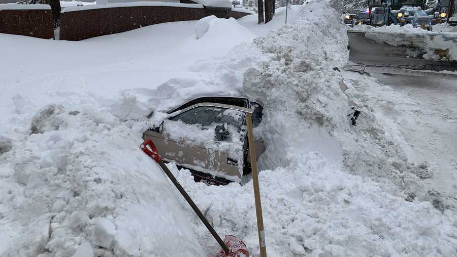 This Feb. 17, 2019 photo provided by City of South Lake Tahoe shows a car buried in snow in South Lake Tahoe, Calif.    Authorities say a snowplow operator inadvertently bumped into a car buried in snow and found a woman unharmed inside. Chris Fiore, spokesman for the city of South Lake Tahoe, highlighted the Feb. 17 incident in a Tuesday, Feb. 26  news release in order to urge safety precautions in winter weather.   (City of South Lake Tahoe via AP)