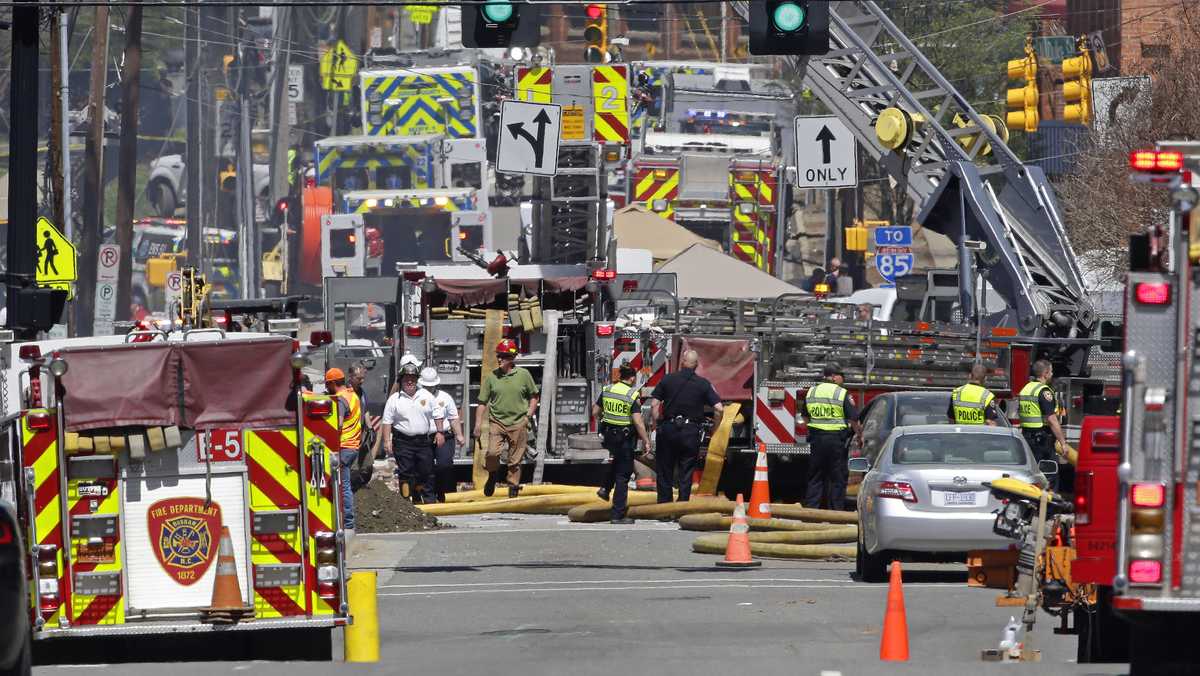 Crews maneuvering through Durham explosion debris after coffee shop ...