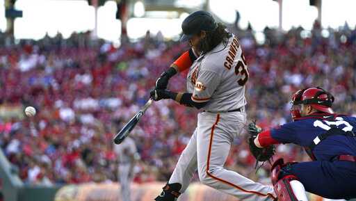 San Francisco Giants' Brandon Crawford hits a go-ahead two-run home run in the ninth inning of a baseball game against the Cincinnati Reds, Sunday, May 5, 2019, in Cincinnati. (AP Photo/Aaron Doster)