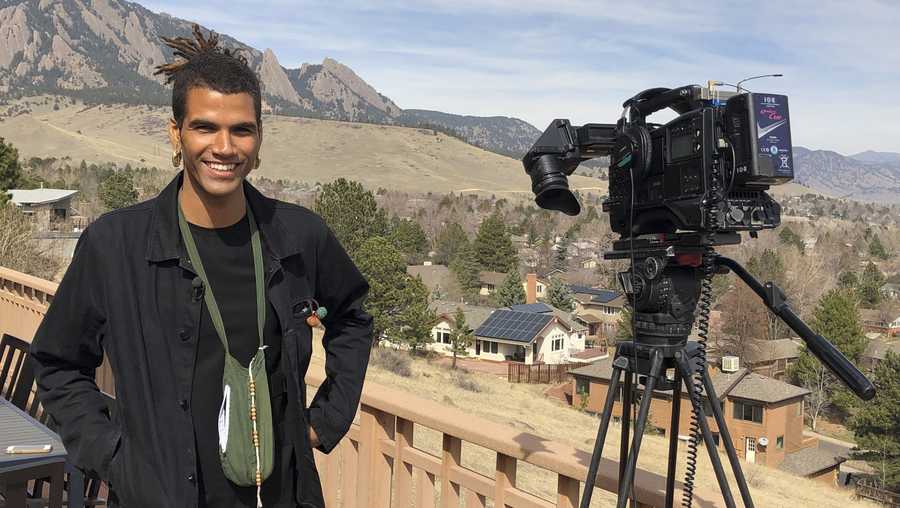 In this undated photo provided by lawyer Siddhartha Rathod, Zayd Atkinson poses for a photo. Atkinson was picking up trash outside his dormitory when a white police officer in Boulder, Colo., detained him in March 2019. The officer, John Smyly, resigned this week under an agreement with city officials who found he had violated department policies.