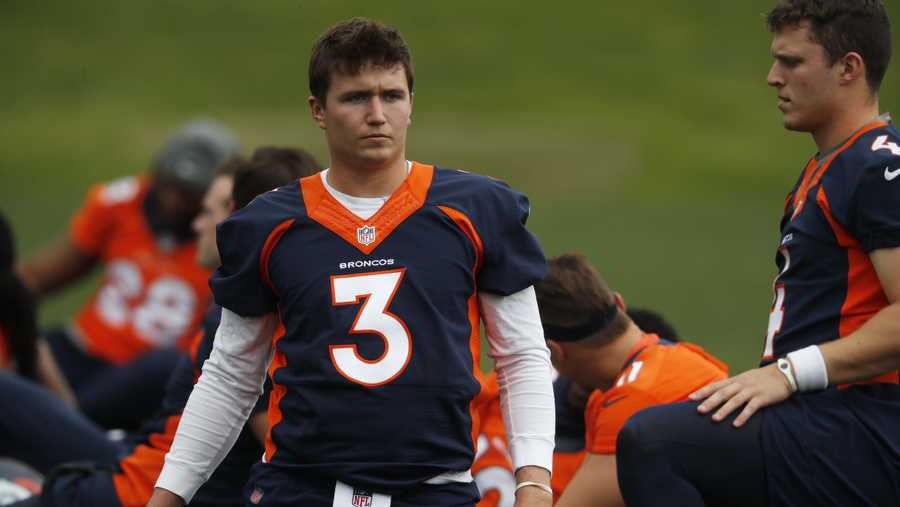 Denver Broncos quarterback Drew Lock takes part in drills at the team's NFL football training facility Tuesday, June 4, 2019, in Englewood, Colo. (AP Photo/David Zalubowski)