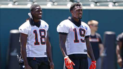 Cincinnati Bengals' wide receiver A. J. Green, 18, who is recovering from  an injury, attends an NFL practice session at the Allianz Park stadium in  north London, Friday, Oct. 25, 2019. The