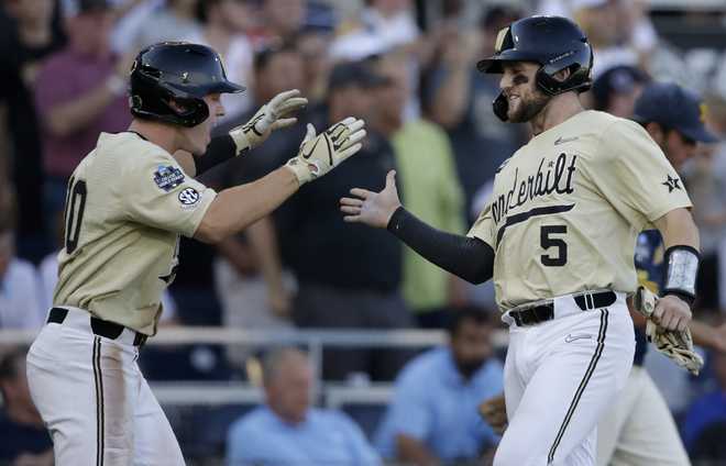 College World Series 2014: Vanderbilt Commodores Claim Program's