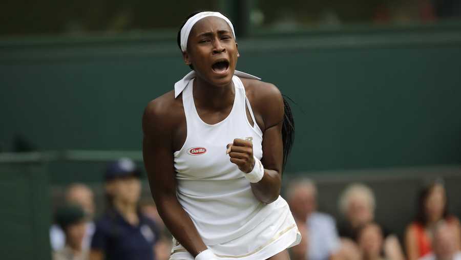 United States' Cori "Coco" Gauff reacts after winning a point against Slovenia's Polona Hercog in a Women's singles match during day five of the Wimbledon Tennis Championships in London, Friday, July 5, 2019.