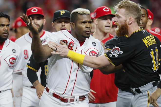 Reds battle Pittsburgh Pirates in bench-clearing brawl in Cincinnati - ABC  News