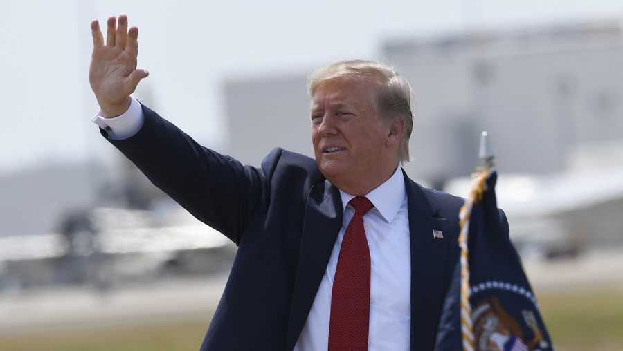 President Donald Trump waves to the crowd after arriving on Air Force One at Louisville International Airport in Louisville, Ky., Wednesday, Aug. 21, 2019. Trump was in town to speak at the American Veterans' 75th National Convention.