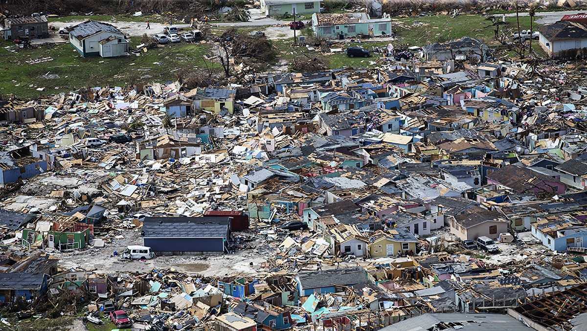 Hurricane Dorian's death toll rises to 30 as it charges up Southeast coast