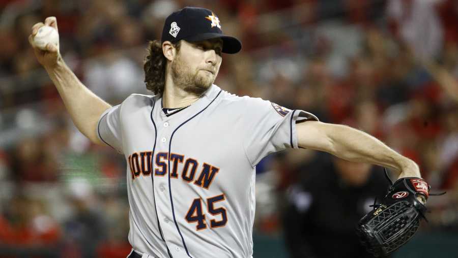 Houston Astros starting pitcher Gerrit Cole throws against the Washington Nationals during the first inning of Game 5 of the baseball World Series Sunday, Oct. 27, 2019, in Washington. 