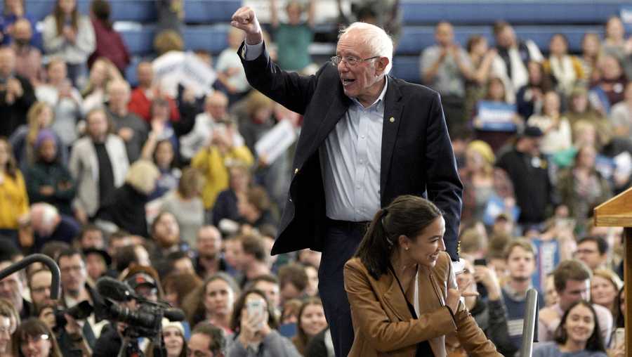 Democratic presidential candidate Sen. Bernie Sanders, I-Vt.,and Rep. Alexandria Ocasio-Cortez, D-N.Y., walk from the stage following an election rally on the campus of Iowa Western Community College in Council Bluffs, Iowa, Friday, Nov. 8, 2019. (AP Photo/Nati Harnik)