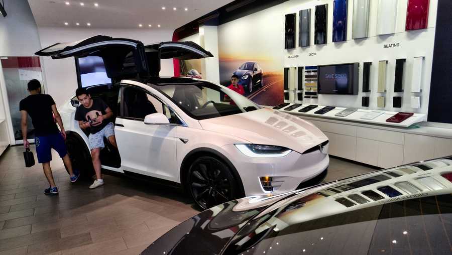 California Cuts Electric Car Rebates Drops Luxury Models