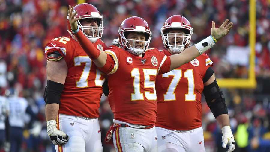 Kansas City Chiefs' Patrick Mahomes (15) celebrates a touchdown pass with Eric Fisher (72) and Mitchell Schwartz (71) during the second half of the NFL AFC Championship football game against the Tennessee Titans Sunday, Jan. 19, 2020, in Kansas City, MO.