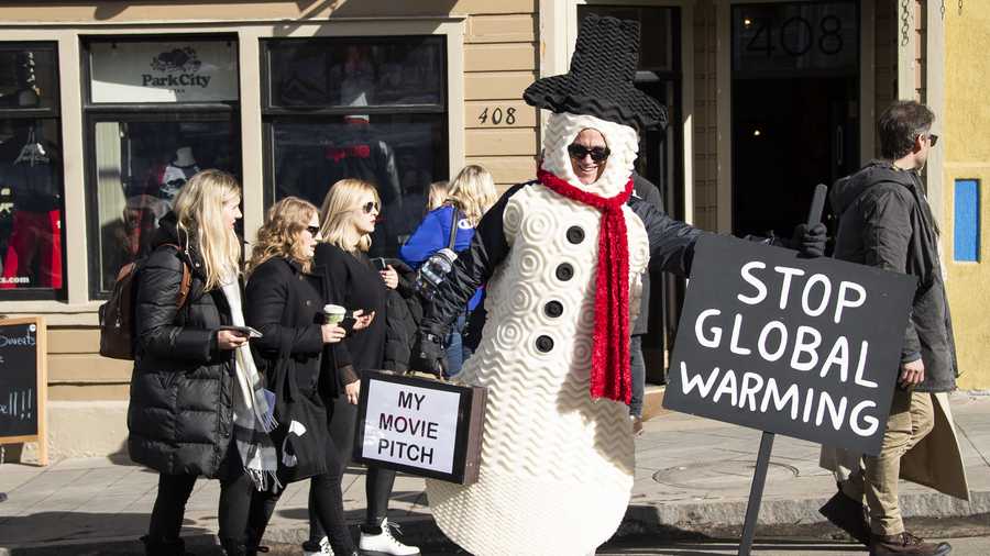 Steve Firkins of Saint Peter, Minn., poses in a costume to raise awareness about climate change and promote his movie "The Filmmakers" during the 2020 Sundance Film Festival on Sunday, Jan. 26, 2020, in Park City, Utah. (Photo by Arthur Mola/Invision/AP)