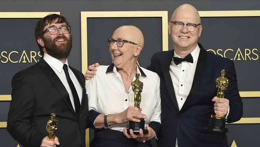 Jeff Reichert, from left, Julia Reichert, and Steven Bognar, winners of the award for best documentary feature for "American Factory", pose in the press room at the Oscars on Sunday, Feb. 9, 2020, at the Dolby Theatre in Los Angeles. (Photo by Jordan Strauss/Invision/AP)