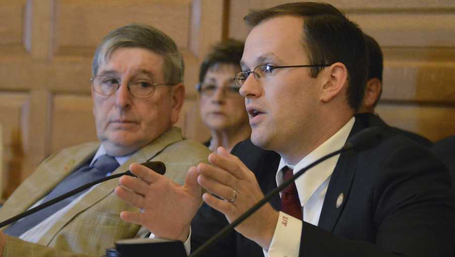 FILE - In this May 13, 2015 file photo, Kansas state Rep. Brandon Whipple, D-Wichita, speaks at the Statehouse in Topeka, Kan. Whipple, now the Mayor of Wichita and three City Council members have quarantined themselves after being told  Tuesday, March 17, 2020,  that two people at a conference they attended last week have the coronavirus. Whipple and council members Becky Tuttle, James Clendenin and Brandon Johnson attended the National League of Cities conference in Washington D.C.  (AP Photo/Nicholas Clayton File)