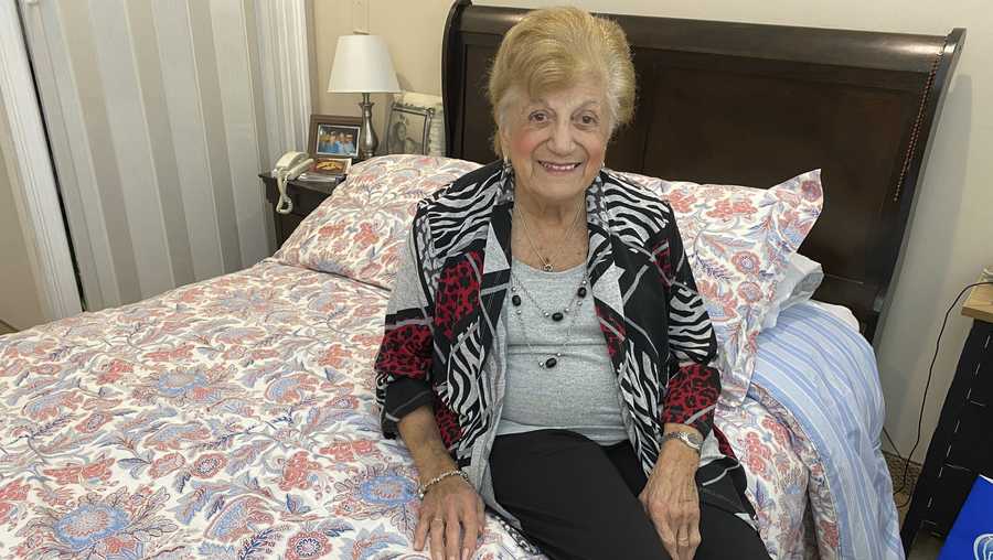 COVID-19 survivor Anna Fortunato poses for a portrait in her room at The Arbors assisted living community in Jericho, N.Y. on Tuesday, March 31, 2020.
