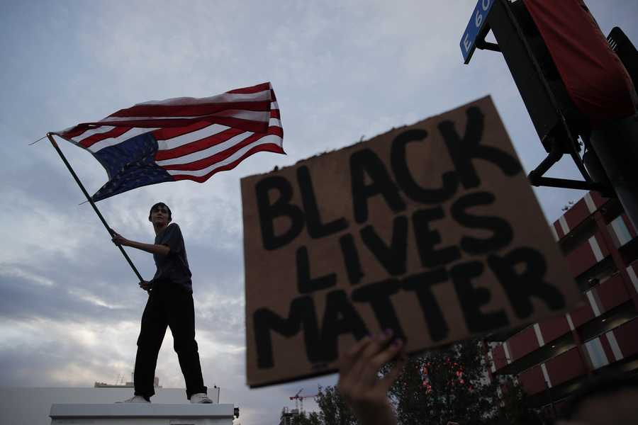 Protesters rally Saturday in Las Vegas, over the death of George Floyd, a black man who was in police custody in Minneapolis.