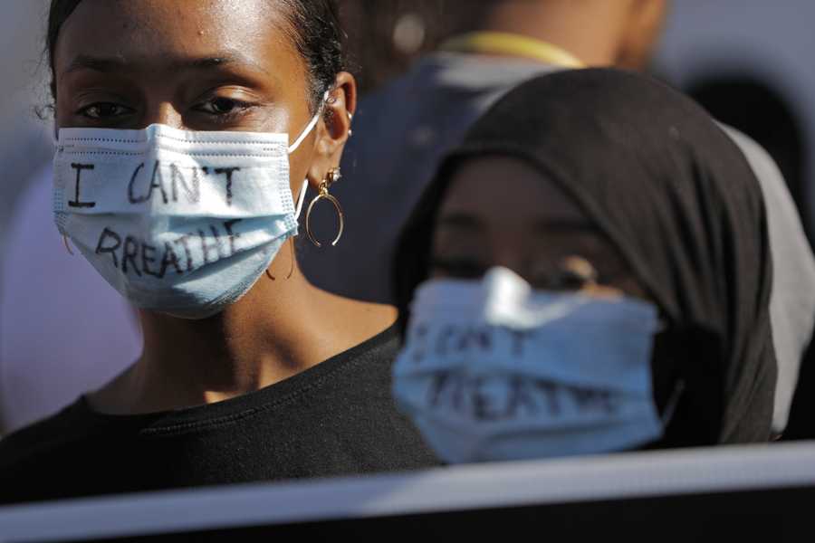 Demonstrators march, Sunday, May 31, 2020, in Minneapolis. Demonstrators march, Sunday, May 31, 2020, in Minneapolis.