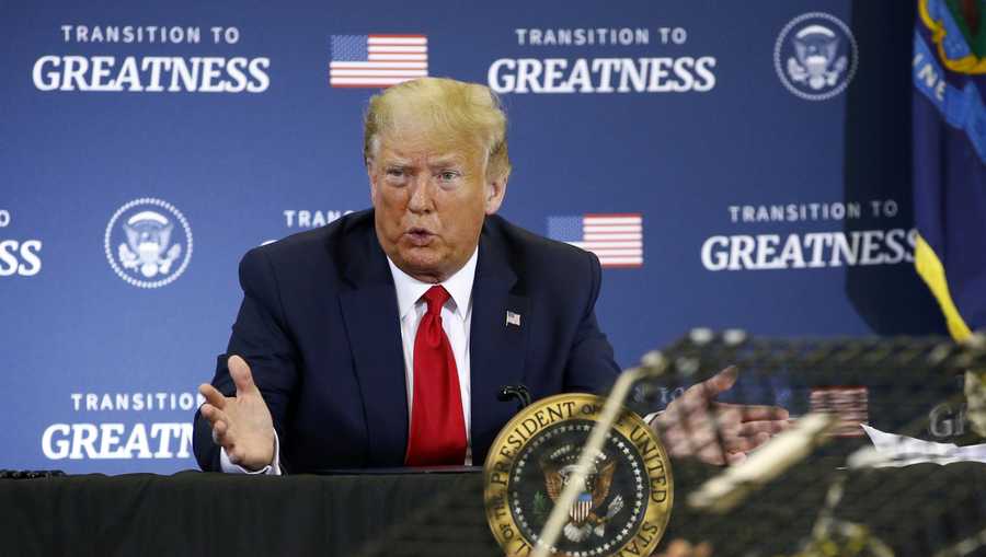 President Donald Trump speaks during a roundtable discussion with commercial fishermen at Bangor International Airport in Bangor, Maine, Friday, June 5, 2020. (AP Photo/Patrick Semansky)