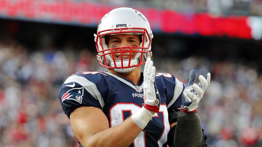 New England Patriots tight end Rob Gronkowski claps after a touchdown at Gillette Stadium in Foxborough, Mass. Sunday, Oct. 16, 2016.
