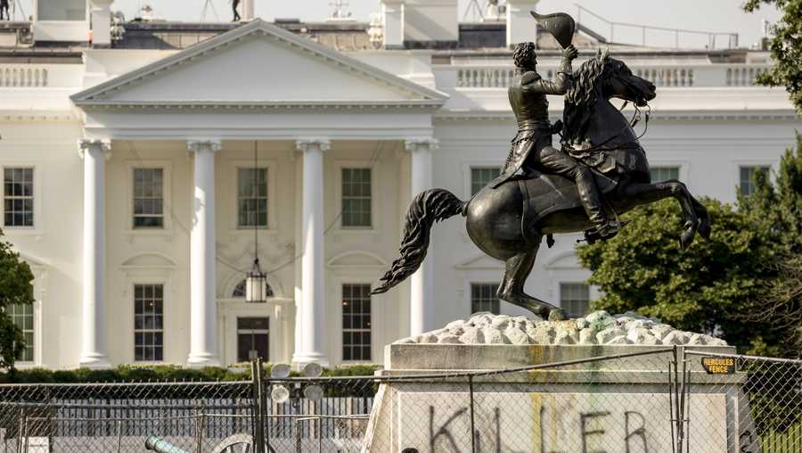 The White House is visible behind a statue of President Andrew Jackson in Lafayette Park, Tuesday, June 23, 2020, in Washington, with the word "Killer" spray painted on its base. Protesters tried to topple the statue Monday night. President Tump had tweeted late Monday that those who tried to topple the statue of President Andrew Jackson in Lafayette Park across the street from the White House faced 10 years in prison under the Veteran&apos;s Memorial Preservation Act.  (AP Photo/Andrew Harnik)
